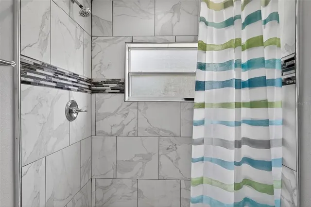 a view of an empty room with window