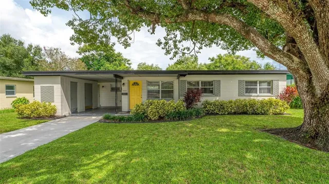 front view of a house and a yard