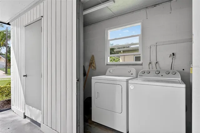 a view of a backyard with a garden and plants