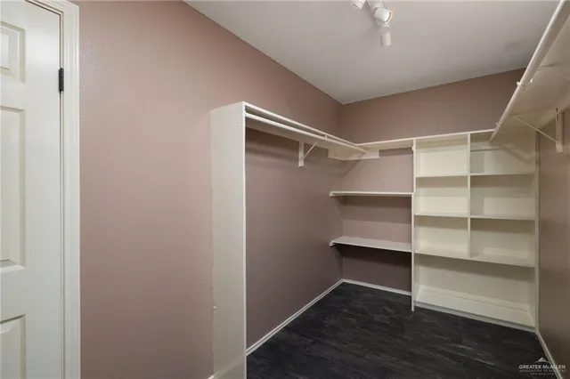 a bathroom with a double vanity sink and mirror
