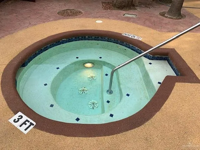 an aerial view of lots of trees and houses