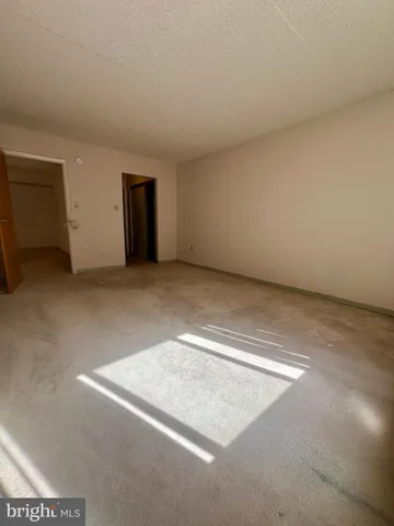 an empty room with closet