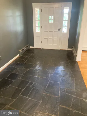 a view of a room with windows