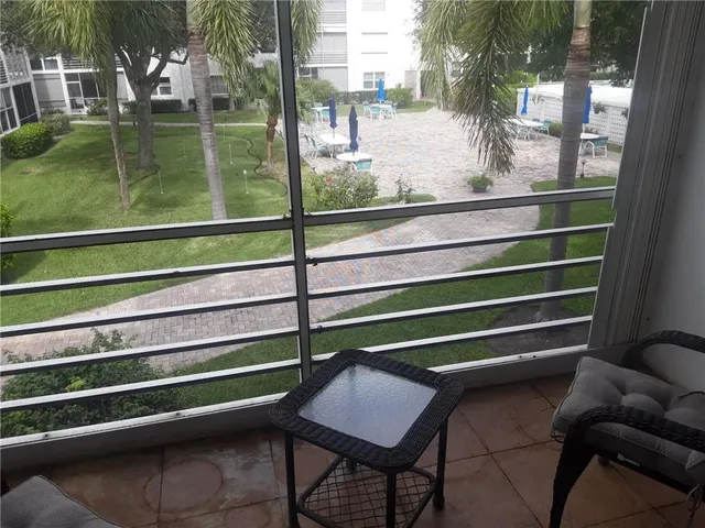 a view of swimming pool from a window