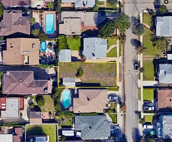 an aerial view of multiple houses with outdoor space