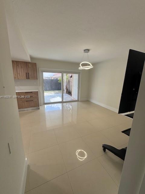 10351 Southwest 154th Place, Unit 68 Miami, FL 33196 - Photo 2 of 13 a view of a livingroom with a fireplace