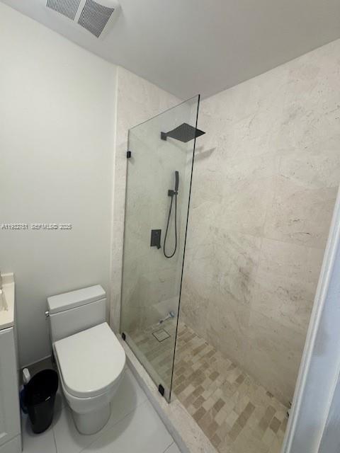 10351 Southwest 154th Place, Unit 68 Miami, FL 33196 - Photo 8 of 13 a bathroom with a toilet and a shower