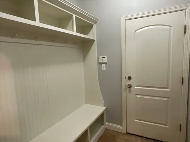 a bathroom with a shower and a tub