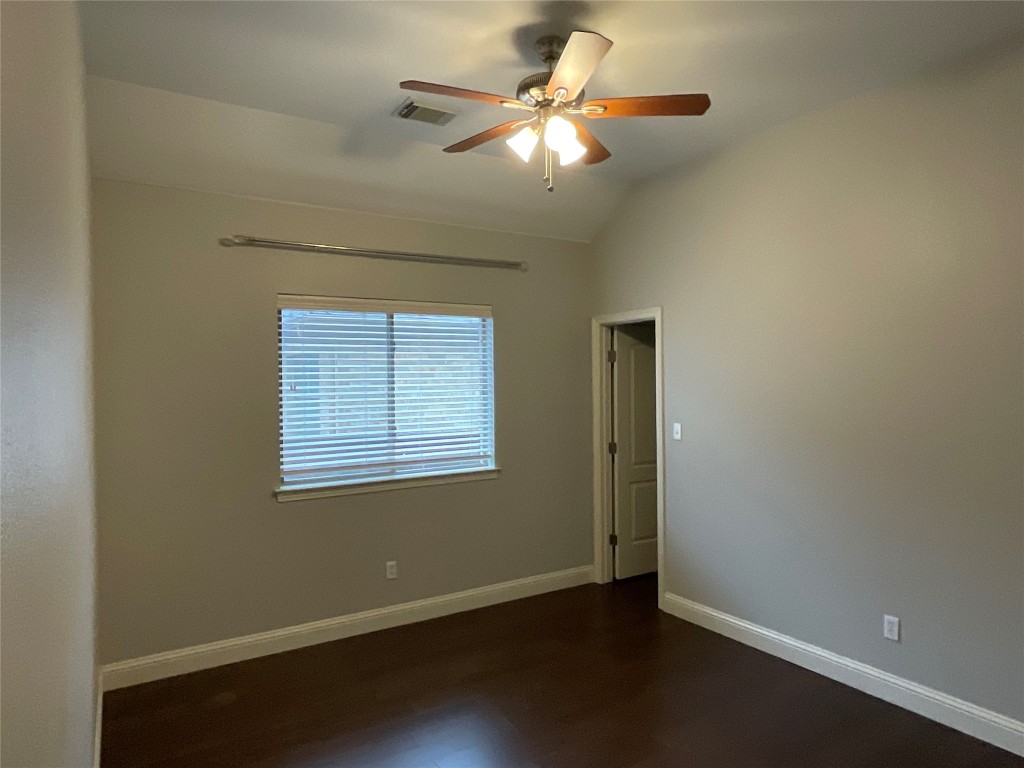 3928 Crest Lane Round Rock, TX 78681 - Photo 28 of 39 an empty room with a window and a fan