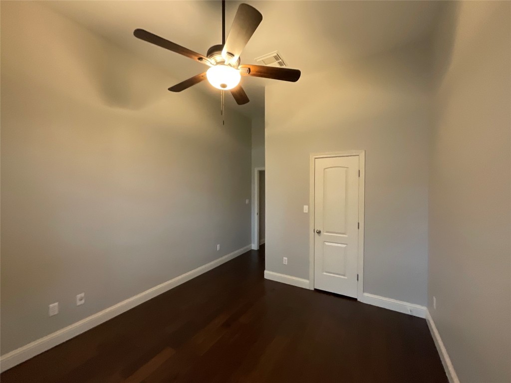 3928 Crest Lane Round Rock, TX 78681 - Photo 34 of 39 an empty room with a fan and a fan