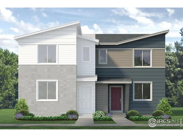 front view of brick house with a yard