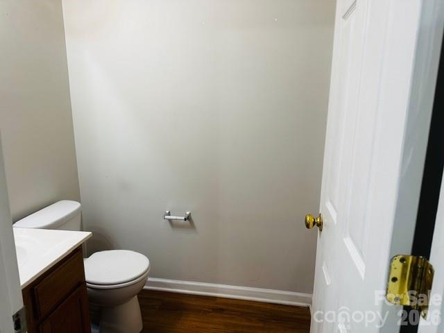 3406 Summerfield Ridge Lane, Unit 17 Matthews, NC 28105 - Photo 11 of 27 a white toilet sitting next to a white wall