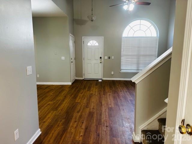 3406 Summerfield Ridge Lane, Unit 17 Matthews, NC 28105 - Photo 12 of 27 a view of empty room with wooden floor and fan