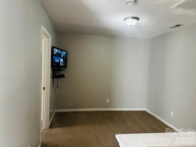3406 Summerfield Ridge Lane, Unit 17 Matthews, NC 28105 - Photo 14 of 27 an empty room with a empty space and windows