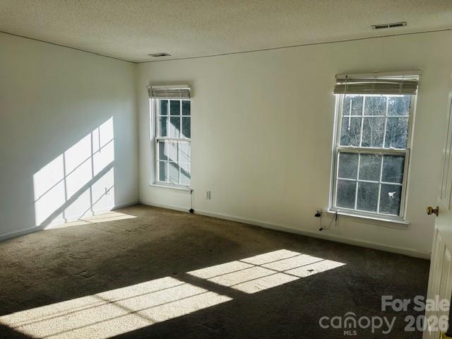 3406 Summerfield Ridge Lane, Unit 17 Matthews, NC 28105 - Photo 15 of 27 a view of an empty room with a window
