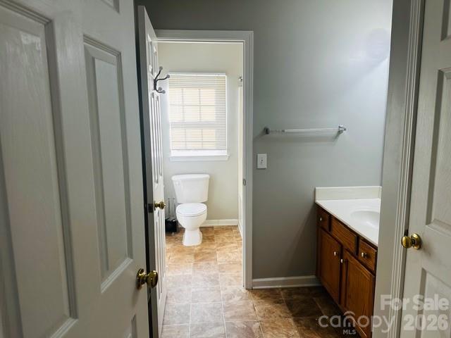 3406 Summerfield Ridge Lane, Unit 17 Matthews, NC 28105 - Photo 20 of 27 a bathroom with a sink a toilet and shower