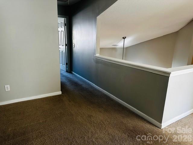 3406 Summerfield Ridge Lane, Unit 17 Matthews, NC 28105 - Photo 21 of 27 an empty room with a door