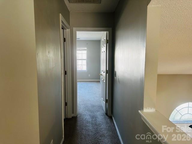 3406 Summerfield Ridge Lane, Unit 17 Matthews, NC 28105 - Photo 22 of 27 a view of a bathroom from a hallway