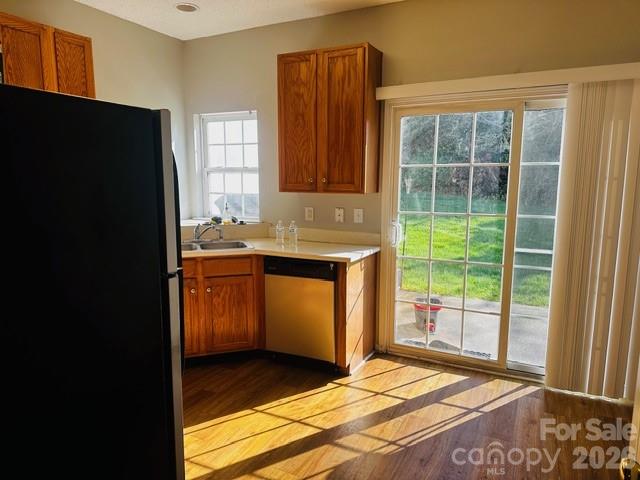 3406 Summerfield Ridge Lane, Unit 17 Matthews, NC 28105 - Photo 26 of 27 a view of a kitchen with a sink and a window