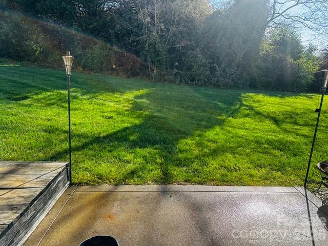 3406 Summerfield Ridge Lane, Unit 17 Matthews, NC 28105 - Photo 5 of 27 a view of a back yard