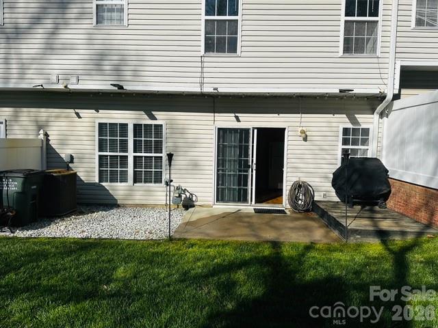 3406 Summerfield Ridge Lane, Unit 17 Matthews, NC 28105 - Photo 6 of 27 a backyard of a house with barbeque oven