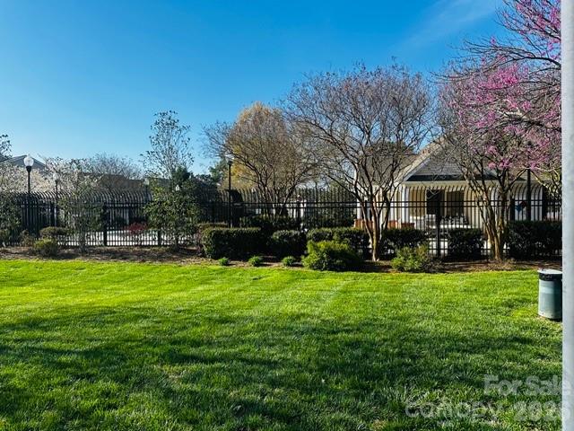 3406 Summerfield Ridge Lane, Unit 17 Matthews, NC 28105 - Photo 7 of 27 a view of a house with a yard