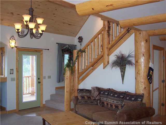 63 Osprey Road Como, CO 80432 - Photo 12 of 19 a view of entryway and hall with wooden floor