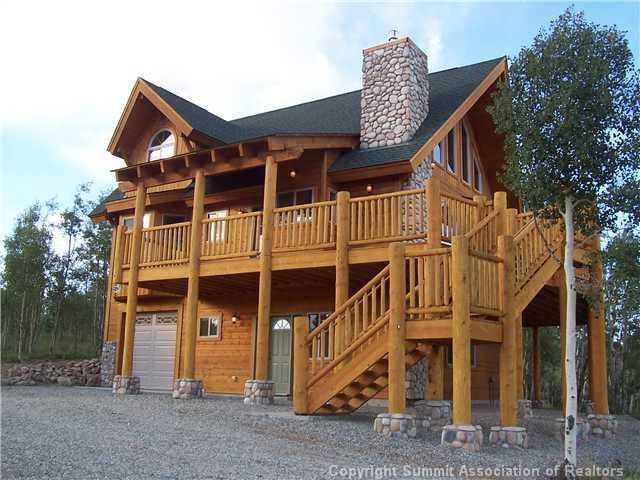 63 Osprey Road Como, CO 80432 - Photo 9 of 19 a front view of a house with a yard