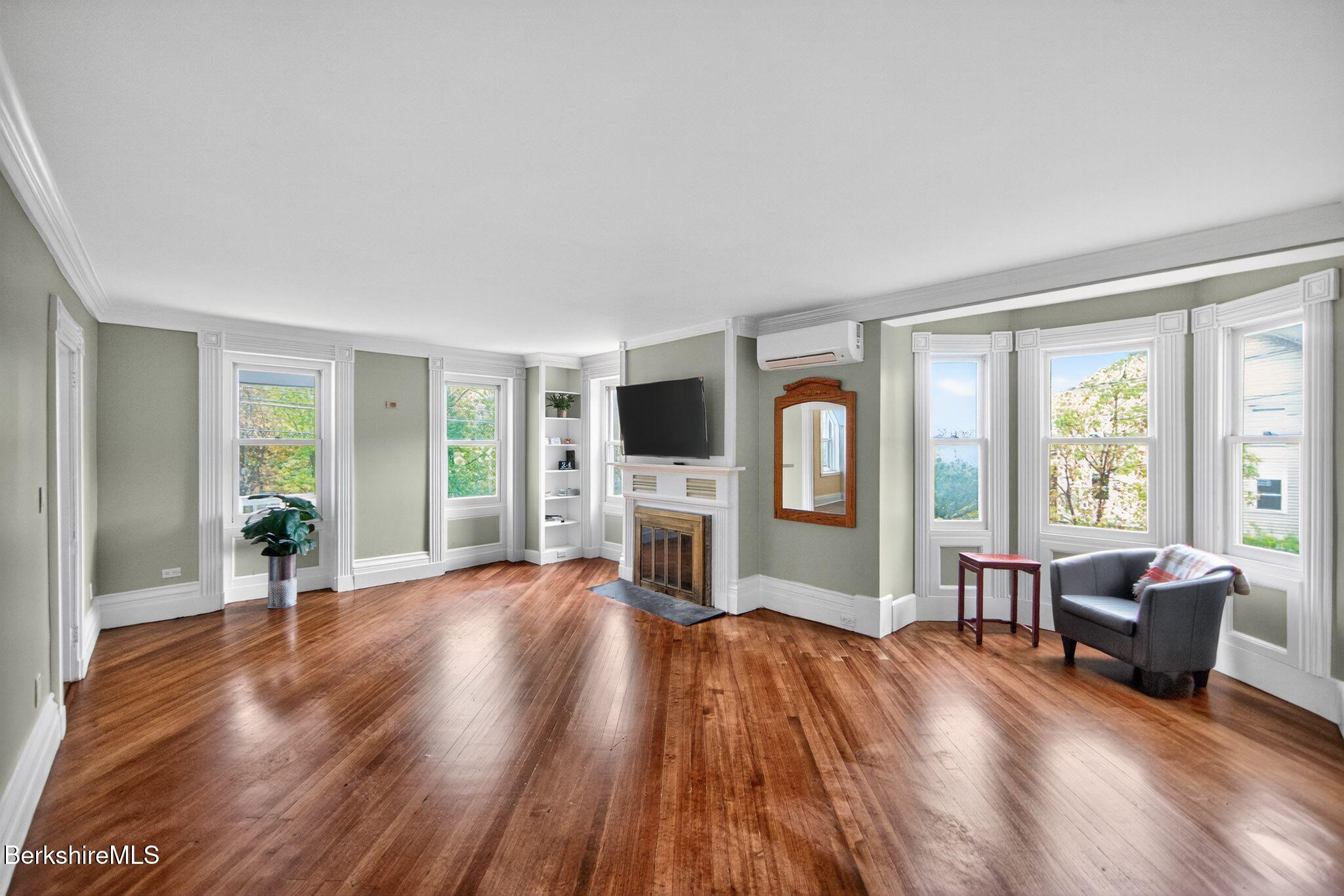 103 Holmes Road Hinsdale, MA 01235 - Photo 10 of 30 a living room with furniture and a flat screen tv