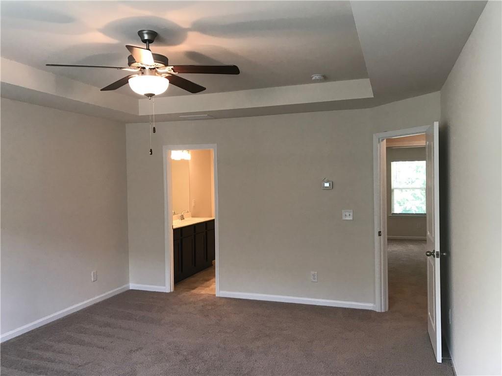 3844 Equity Lane Powder Springs, GA 30127 - Photo 16 of 38 wooden floor in an empty room