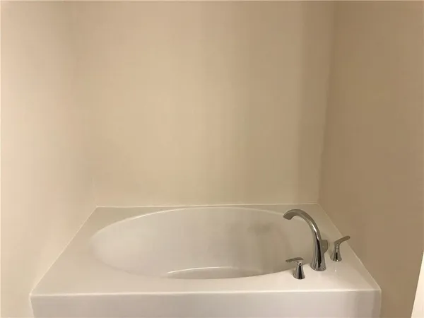 a bathroom with a bathtub