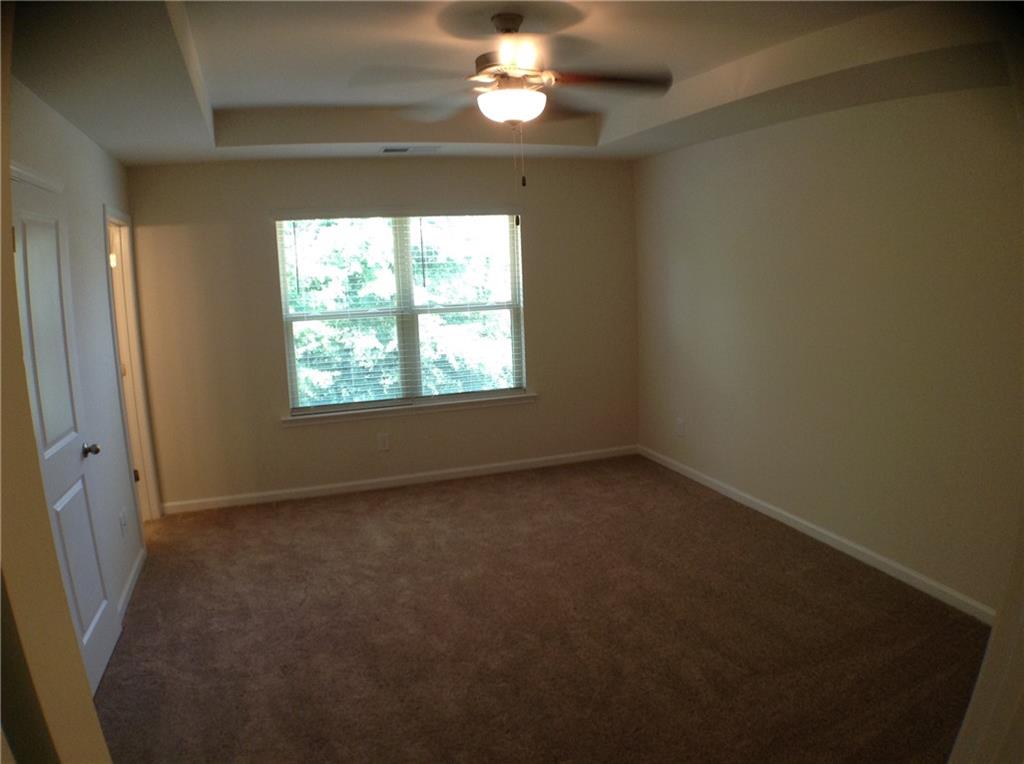 3844 Equity Lane Powder Springs, GA 30127 - Photo 26 of 38 an empty room with a window