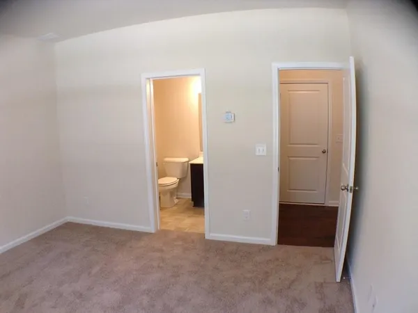an empty room and closet area