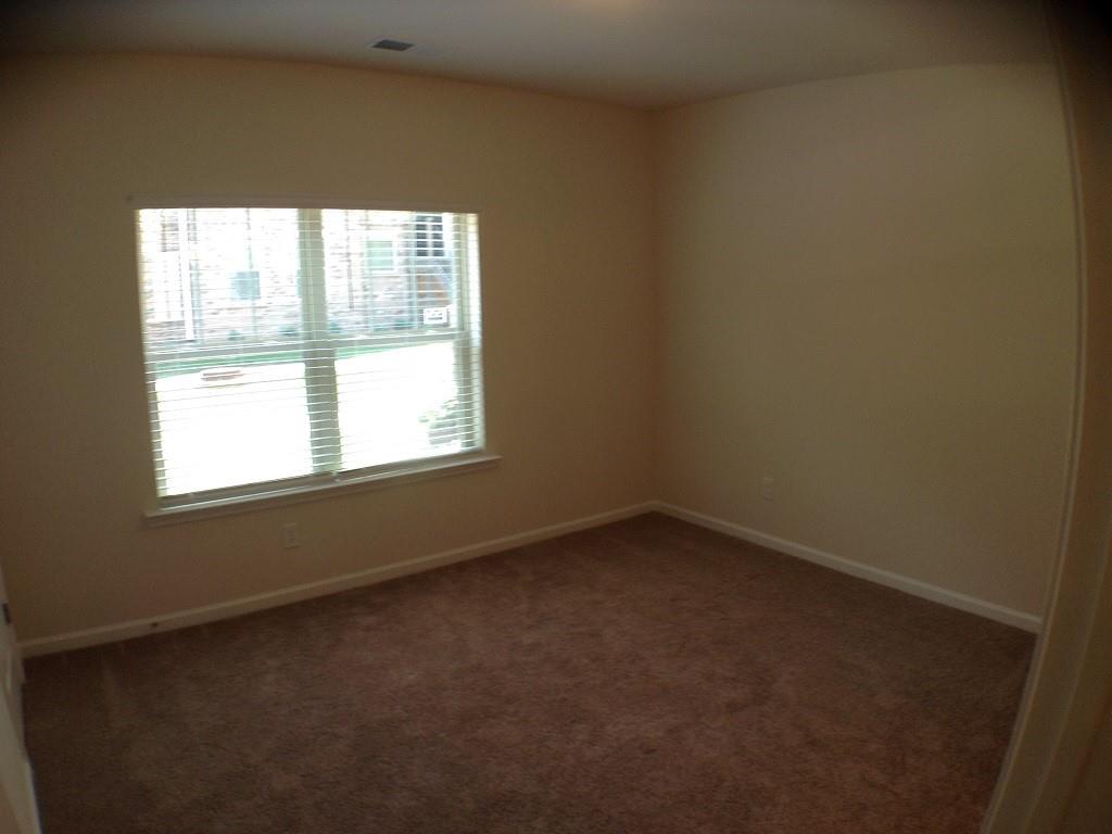 3844 Equity Lane Powder Springs, GA 30127 - Photo 34 of 38 an empty room with a window