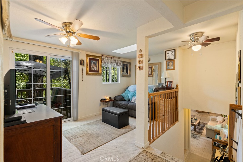 10311 Redwood Road Middletown, CA 95461 - Photo 13 of 48 a living room with furniture and a window