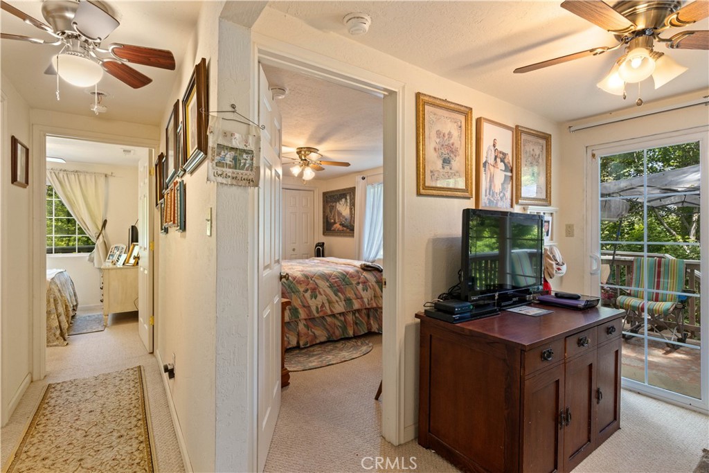 10311 Redwood Road Middletown, CA 95461 - Photo 14 of 48 a view of a livingroom with furniture workspace and a window