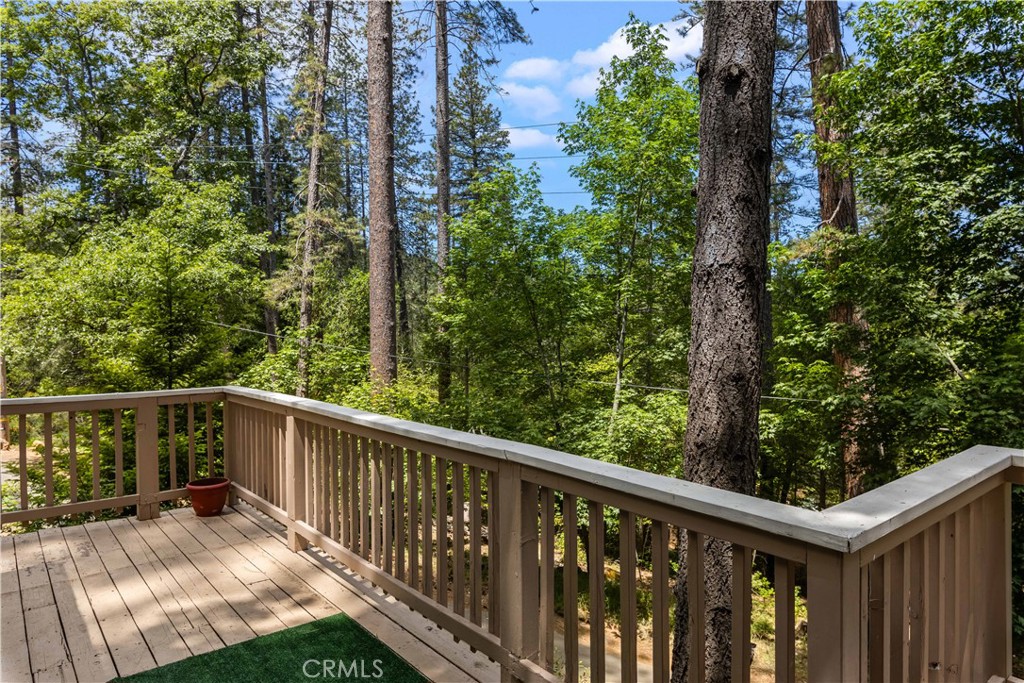 10311 Redwood Road Middletown, CA 95461 - Photo 22 of 48 a view of a balcony with trees