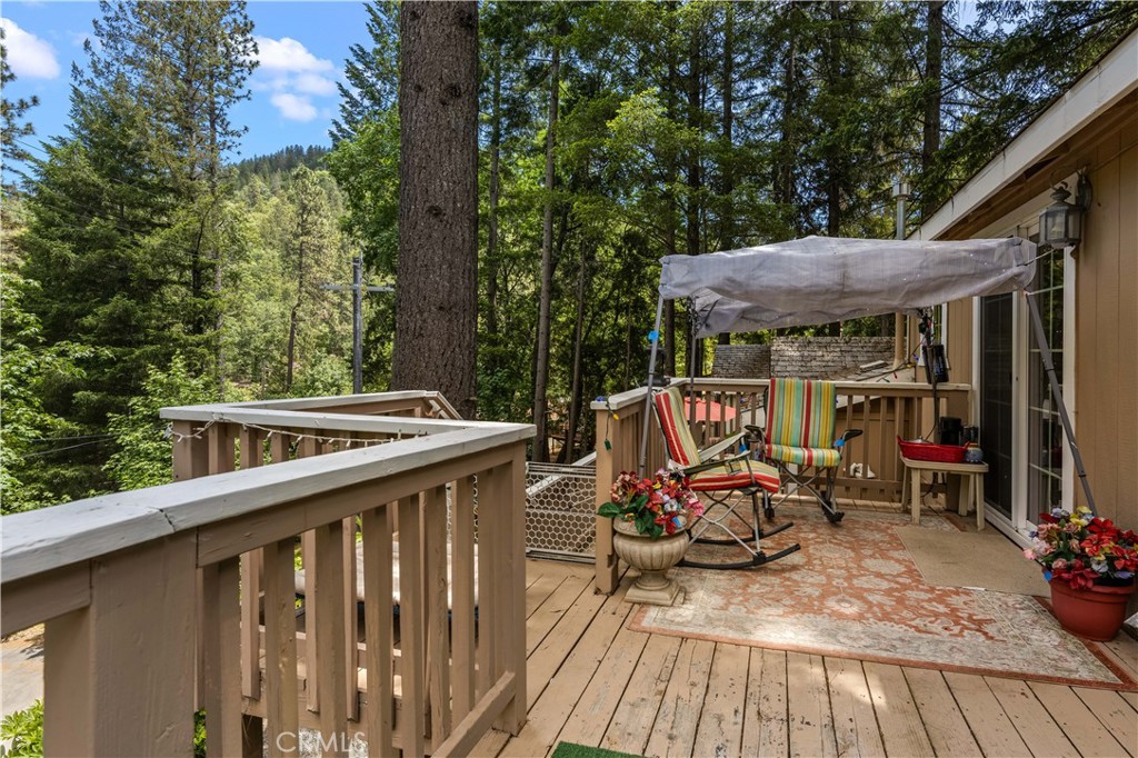 10311 Redwood Road Middletown, CA 95461 - Photo 23 of 48 a view of sitting area with furniture on wooden deck