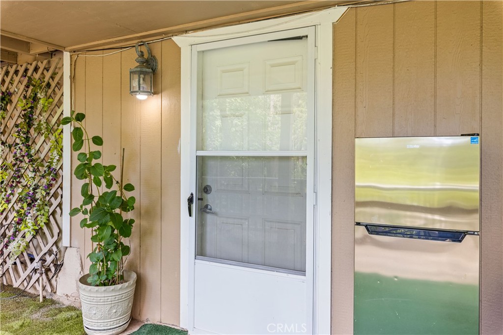 10311 Redwood Road Middletown, CA 95461 - Photo 28 of 48 a bathroom with a glass shower door and a sink