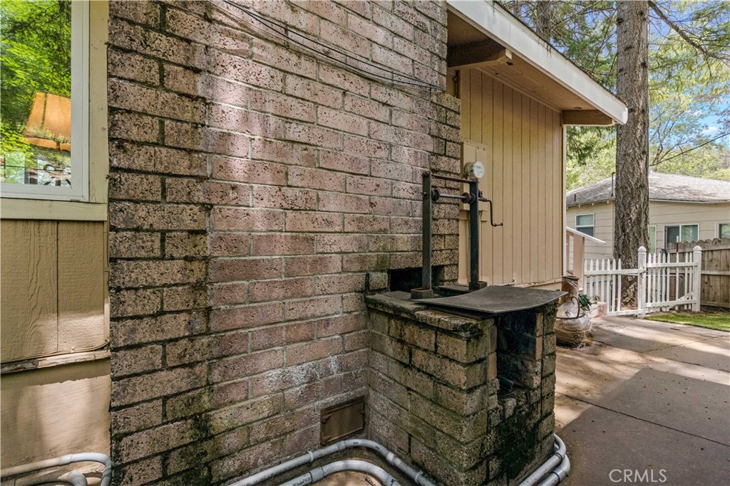 10311 Redwood Road Middletown, CA 95461 - Photo 40 of 48 a bathroom with a sink and a mirror