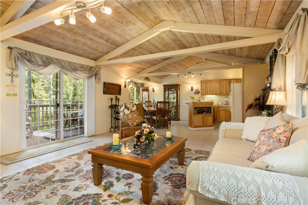 10311 Redwood Road Middletown, CA 95461 - Photo 4 of 48 a living room with furniture and a fireplace