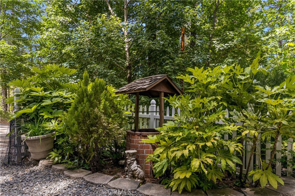 10311 Redwood Road Middletown, CA 95461 - Photo 43 of 48 a backyard of a house with table and chairs