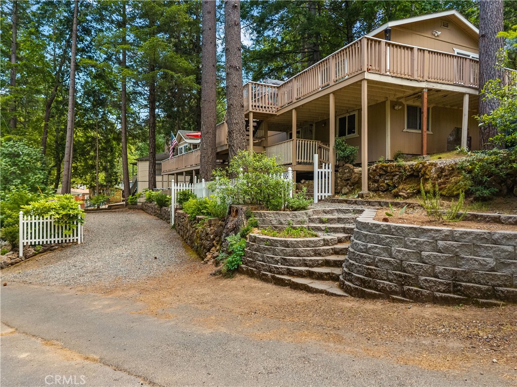 10311 Redwood Road Middletown, CA 95461 - Photo 45 of 48 a view of a house with a yard