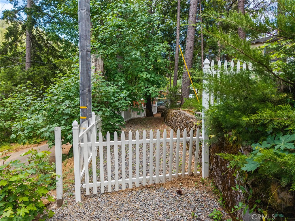 10311 Redwood Road Middletown, CA 95461 - Photo 47 of 48 a house view with a garden