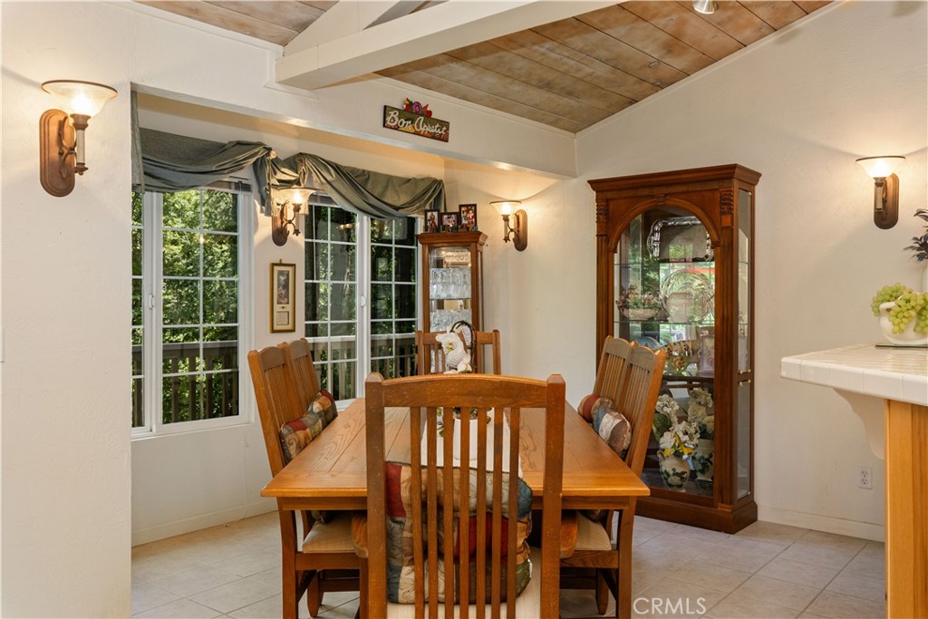 10311 Redwood Road Middletown, CA 95461 - Photo 8 of 48 a view of a dining room with furniture window and outside view