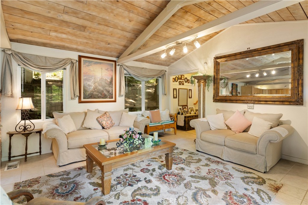 10311 Redwood Road Middletown, CA 95461 - Photo 10 of 48 a living room with furniture and a large window
