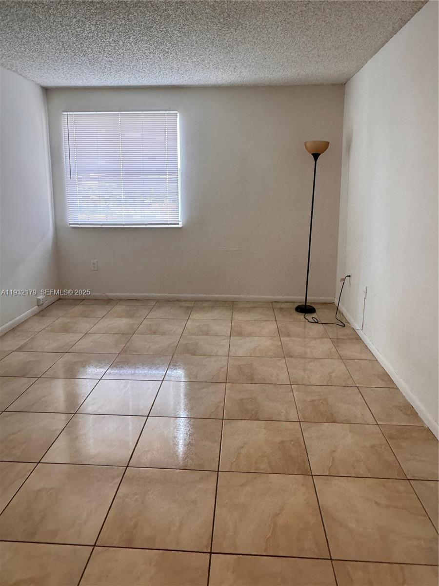 6280 Northwest 186th Street, Unit 310 Hialeah, FL 33015 - Photo 4 of 11