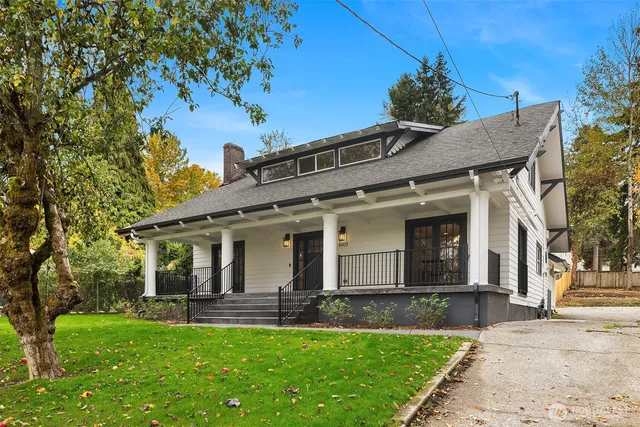 front view of a house with a yard