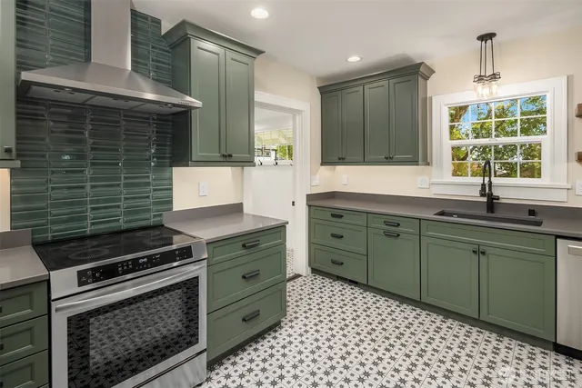 a kitchen with a sink stove and cabinets