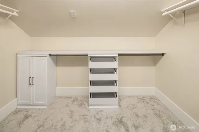 a view of an empty walk in closet